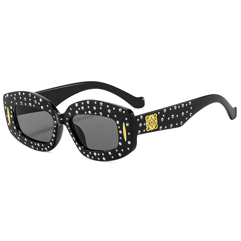 Women striking sunglasses with glamorous rhinestone details Stornfield