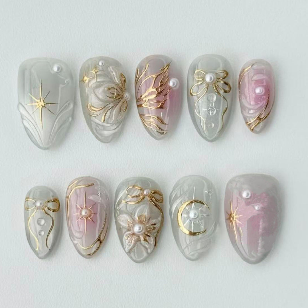 Artificial nail set with filigree golden accents Stornfield