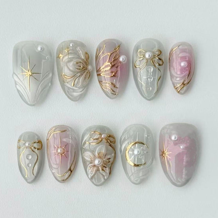 Artificial nail set with filigree golden accents Stornfield