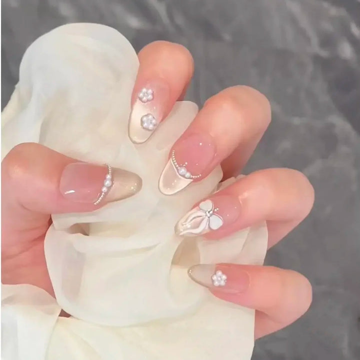 Artificial nails with elegant, adorned tips Stornfield