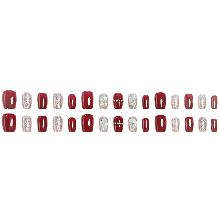 Glamorous artificial nail set with sparkling 3D applications and elegant embellishments Stornfield