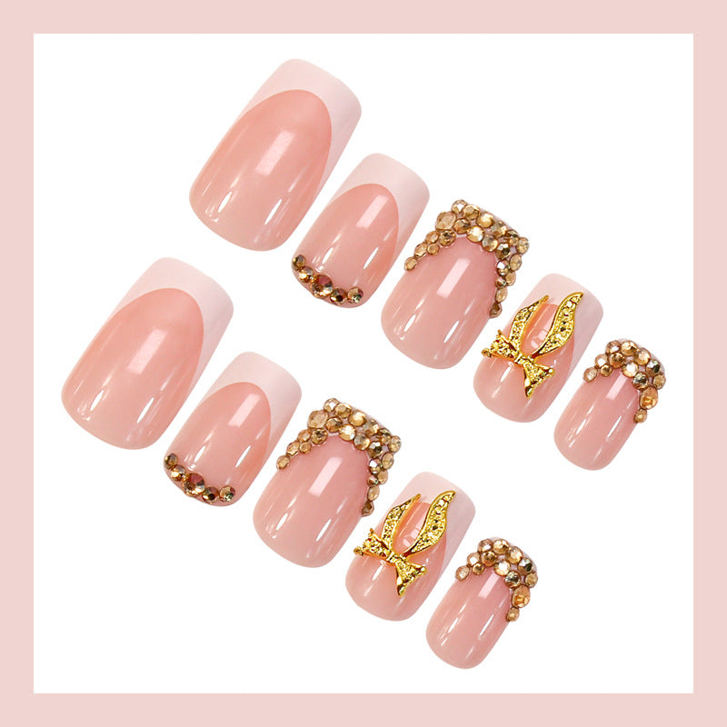Nail art set with elegant glitter ornaments and stylish French tips Stornfield