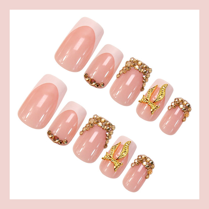 Nail art set with elegant glitter ornaments and stylish French tips Stornfield