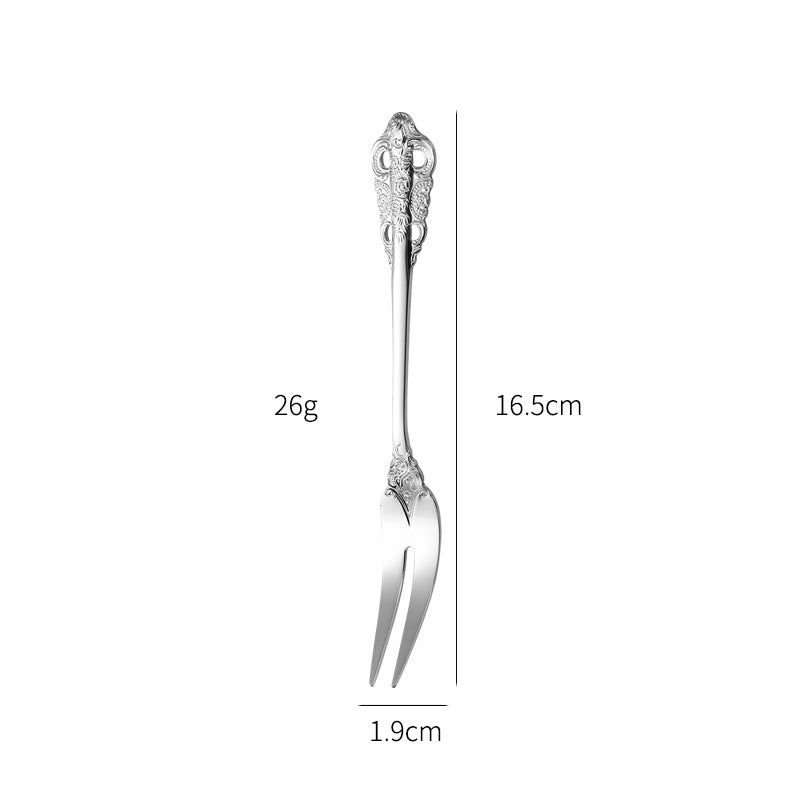 Elegant fish fork with artistic handle design Stornfield