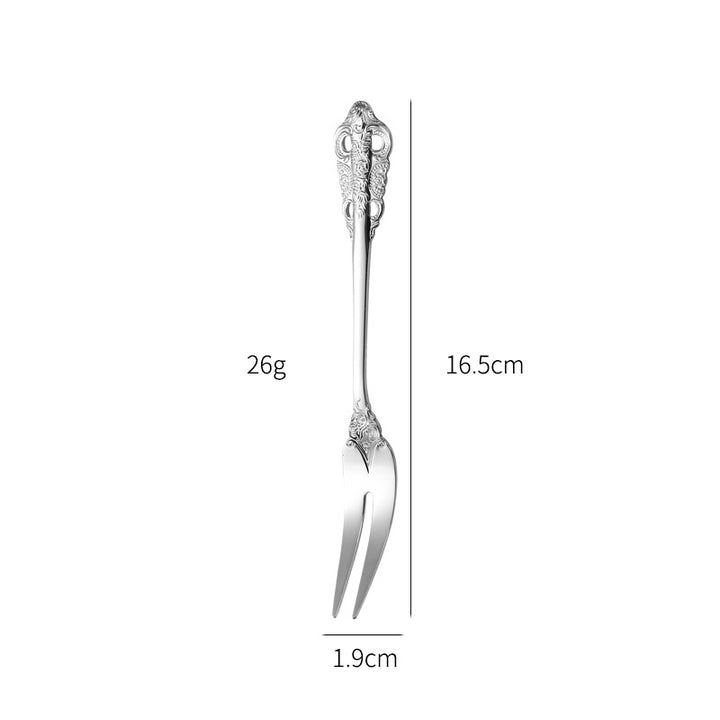 Elegant fish fork with artistic handle design Stornfield