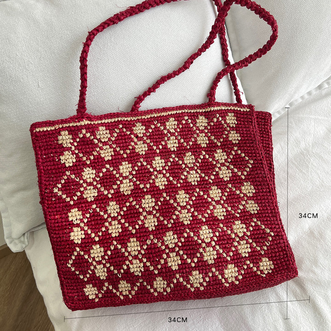 Handcrafted knit bag with floral design Stornfield
