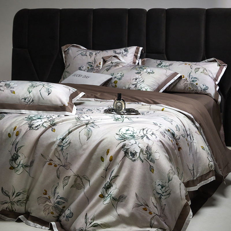 Fine woven satin bedding set with watercolor floral print, satin edge & hotel closure