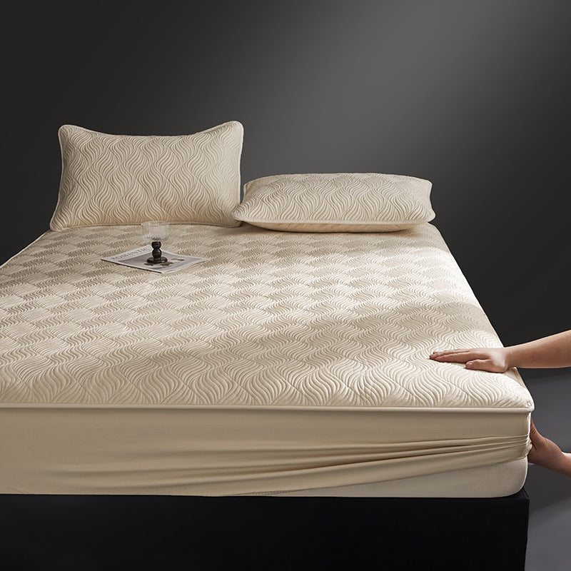 Quilted mattress topper as fitted cover with non-slip underside