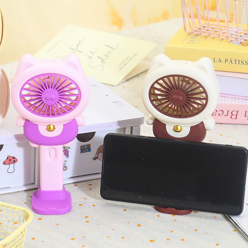 Ladies handheld fan in playful animal design Stornfield