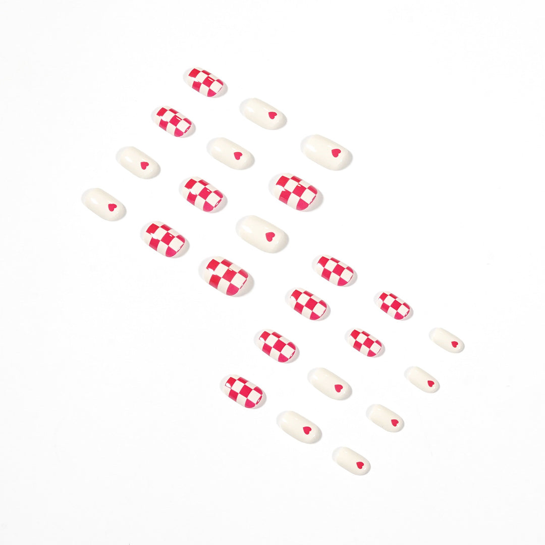 Trendy Nail Art with Heart and Checkered Patterns Stornfield