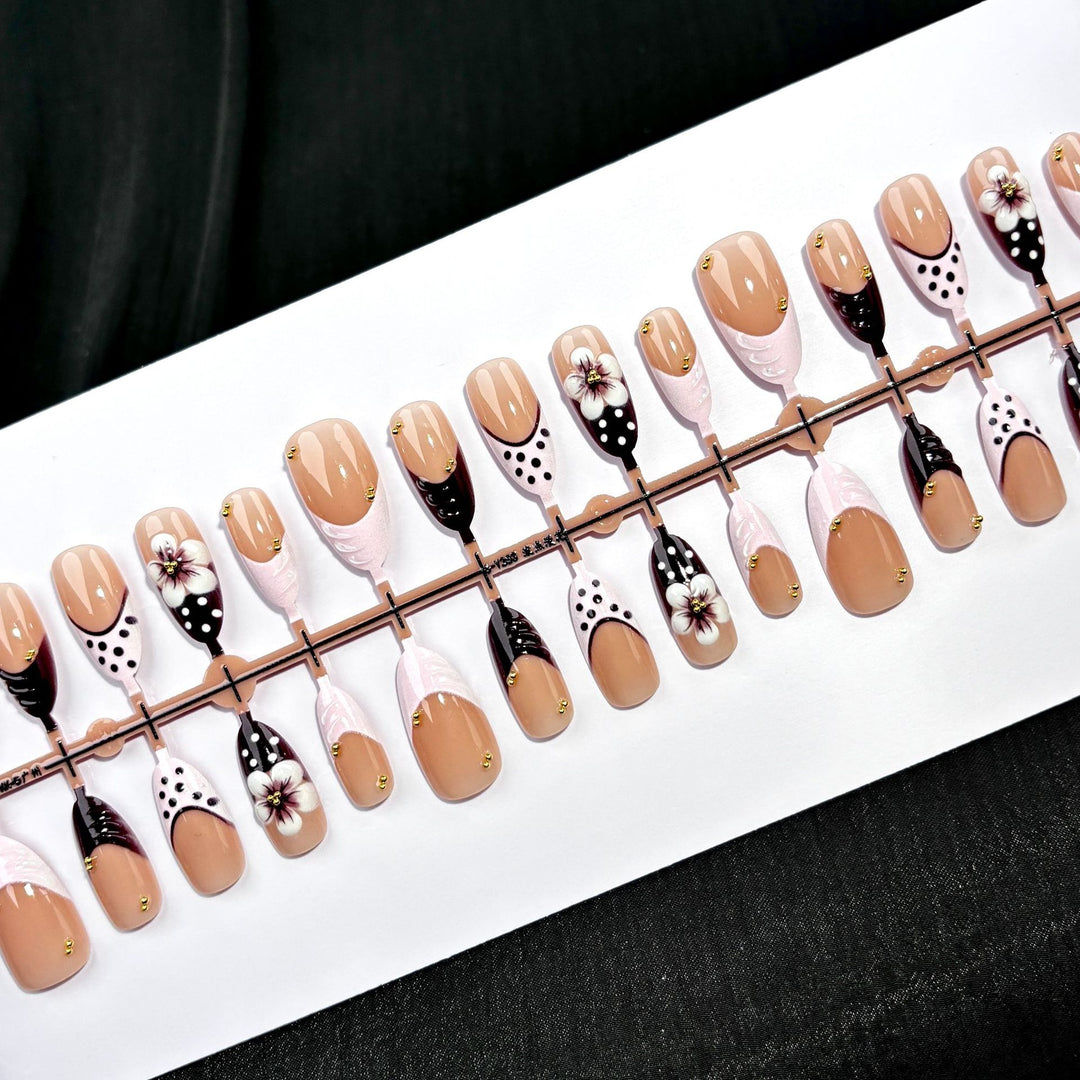 Artistic Press-On Nail Set with Floral and Polka Dot Designs