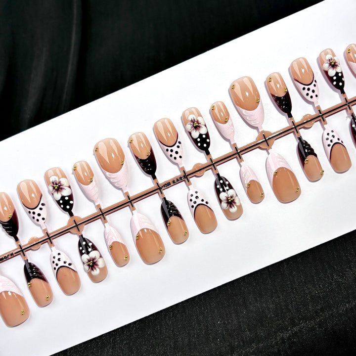 Artistic Press-On Nail Set with Floral and Polka Dot Designs