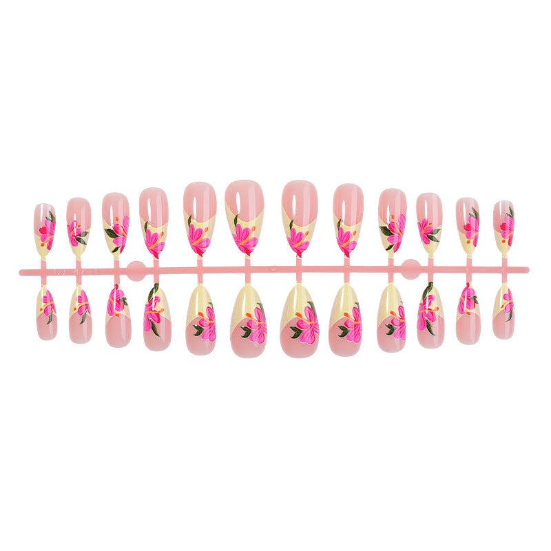 Artificial nail set with floral accents and glamorous finish Stornfield