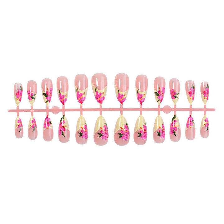 Artificial nail set with floral accents and glamorous finish Stornfield