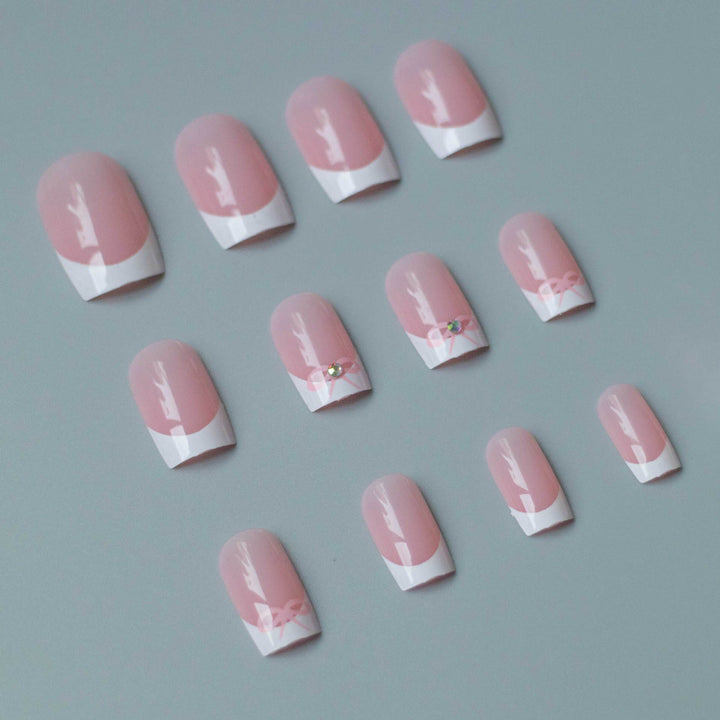 Elegant French Tip Nail Art Set with Delicate Bow Accents