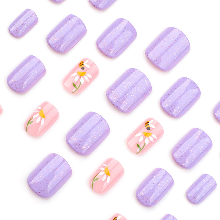 Artfully designed nail extensions with flower design Stornfield