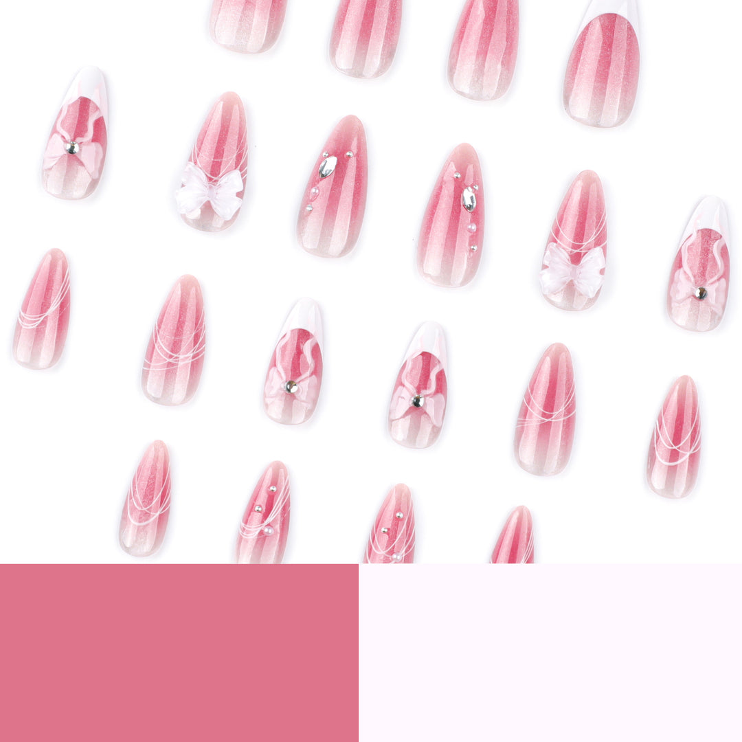 Artful acrylic nails with floral design and glitter embellishment Stornfield