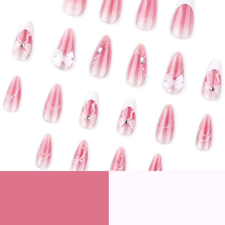 Artful acrylic nails with floral design and glitter embellishment Stornfield