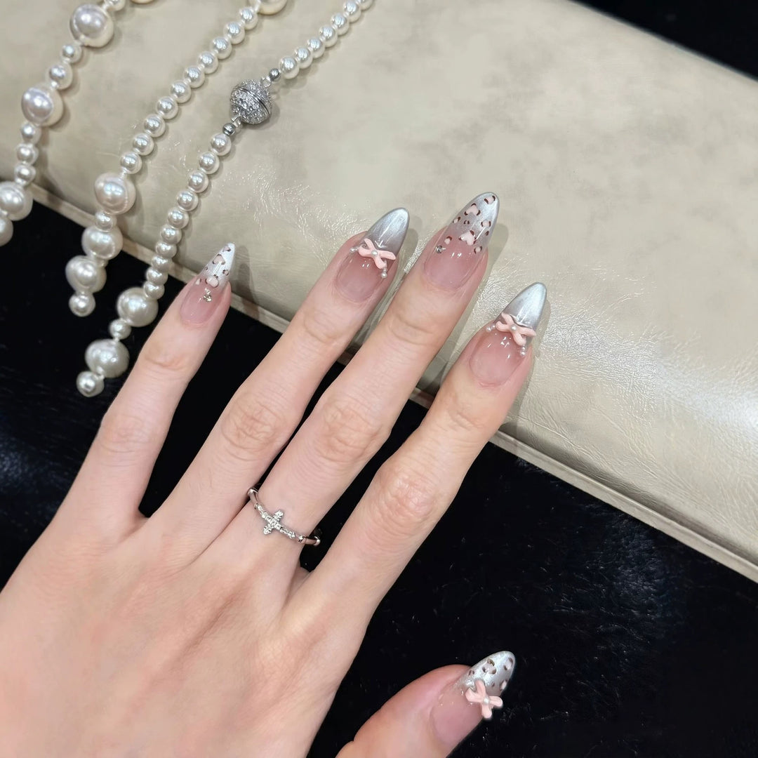 Decorative Press-On Nail Design with Bow Accents Stornfield