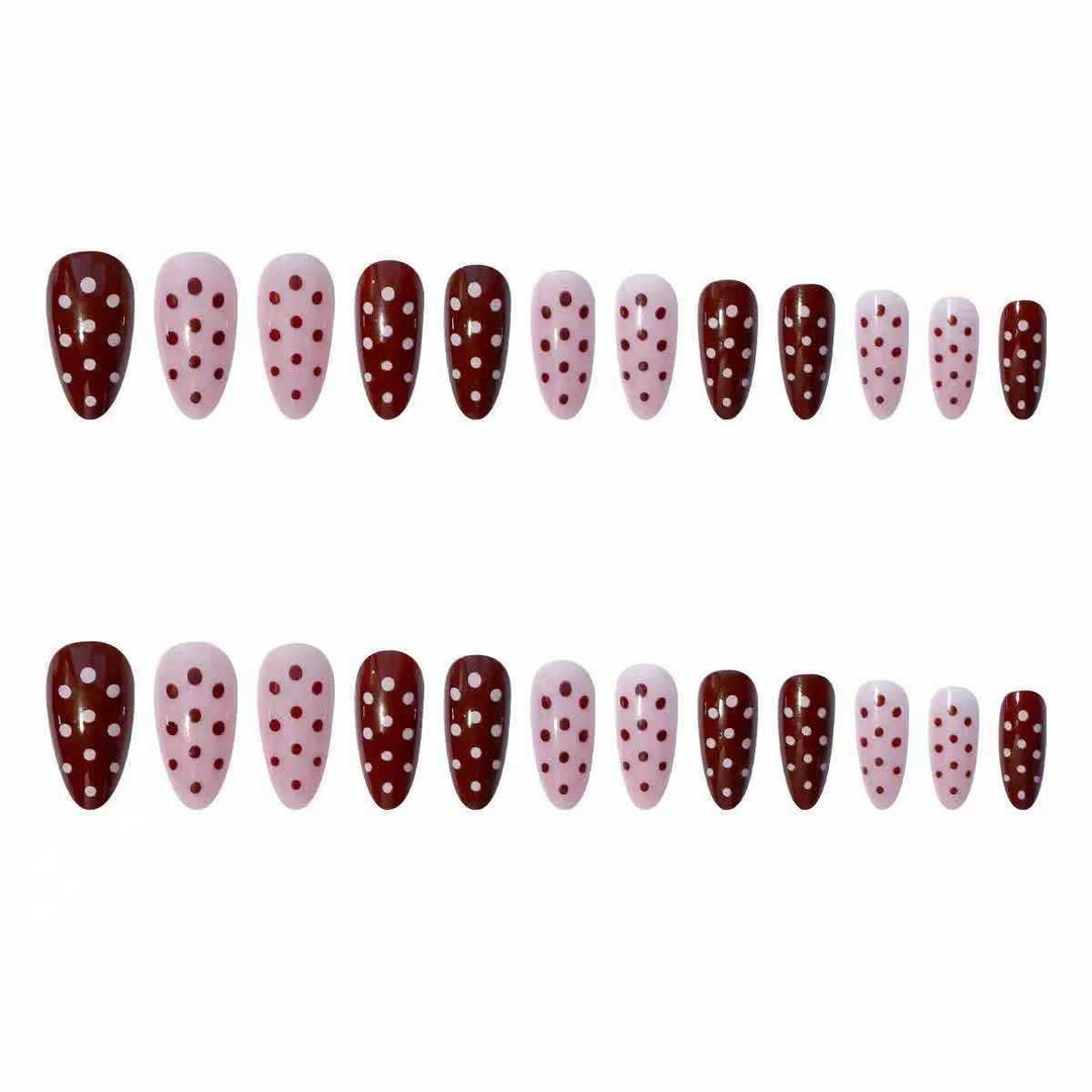 Artifical nail set with playful polka dot design and elegant accents Stornfield