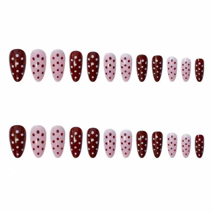 Artifical nail set with playful polka dot design and elegant accents Stornfield