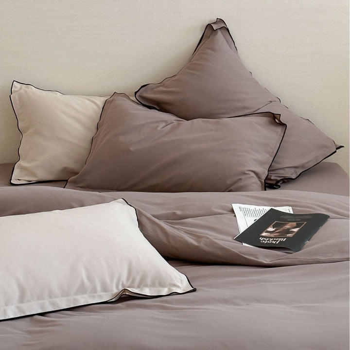 Reversible Cotton Sateen Duvet Cover Set with Contrast Piping and Pillow Shams