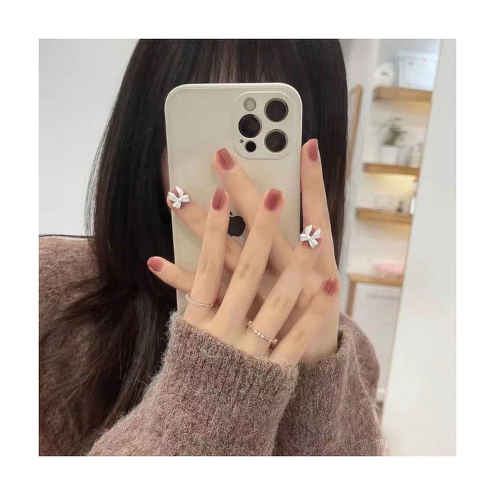 Elegant artificial nails with delicate flower accents Stornfield