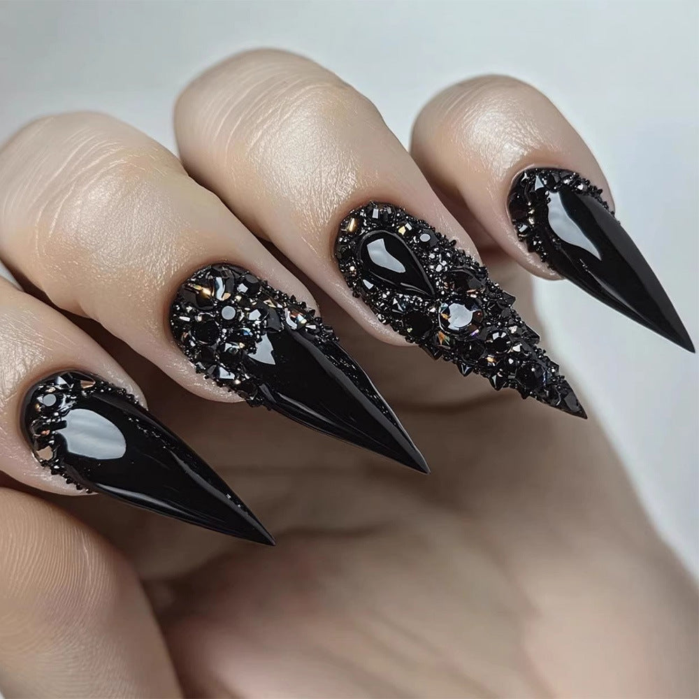 Artificial nails in elegant stiletto design with sparkling rhinestone appliqués Stornfield