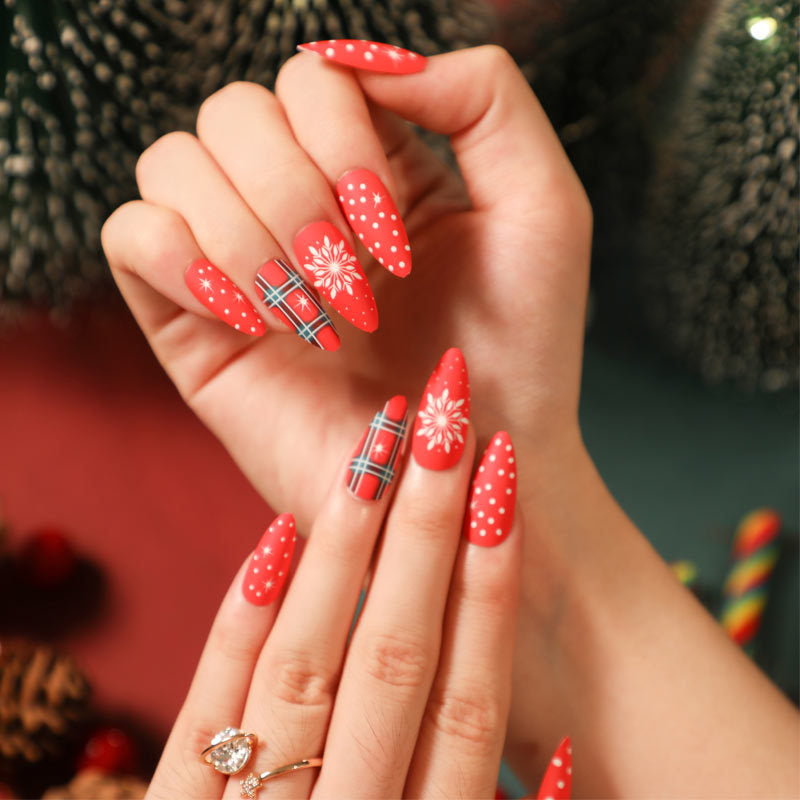 Artful stiletto nails with festive design Stornfield