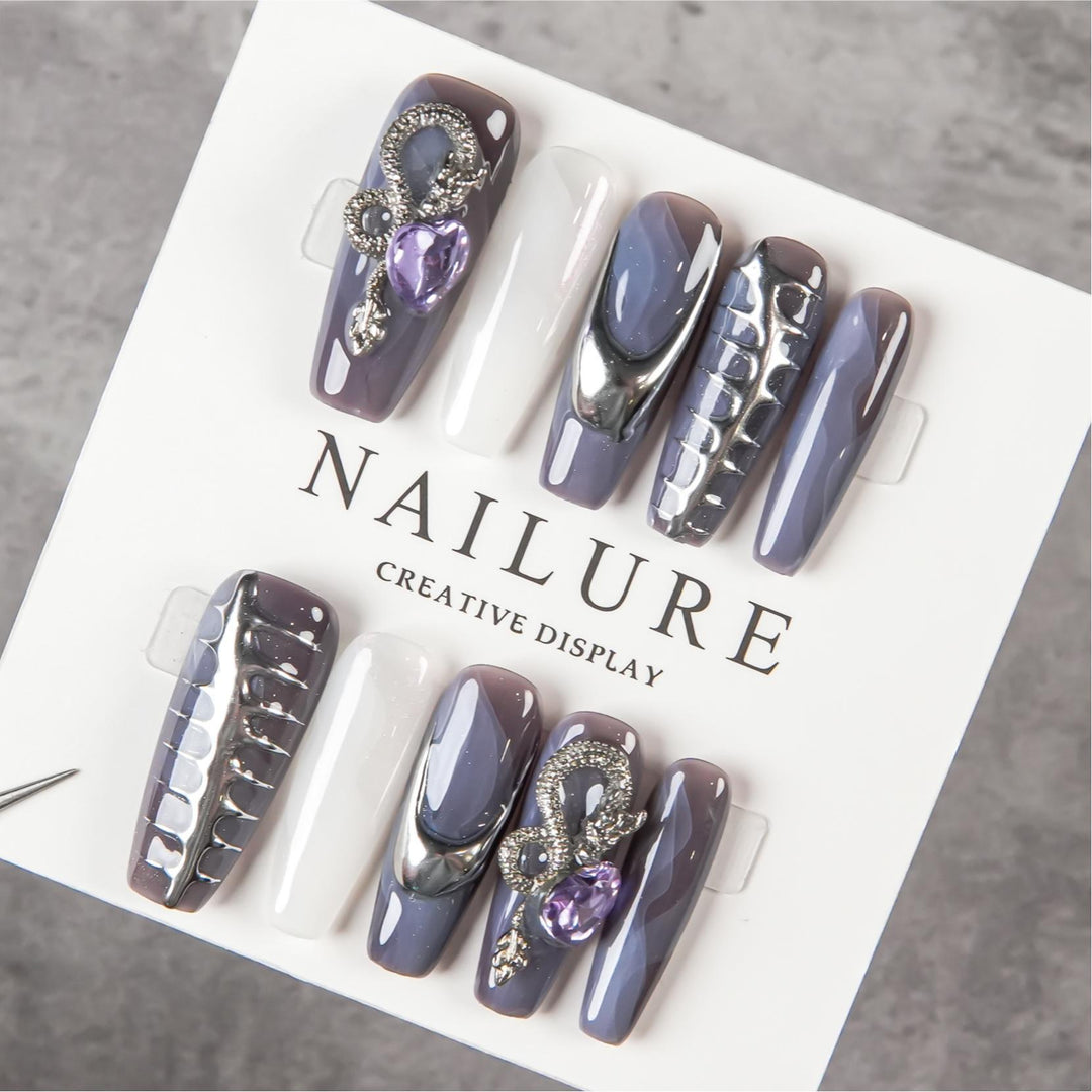 Artistic Sculpted Nail Set with Metallic Accents
