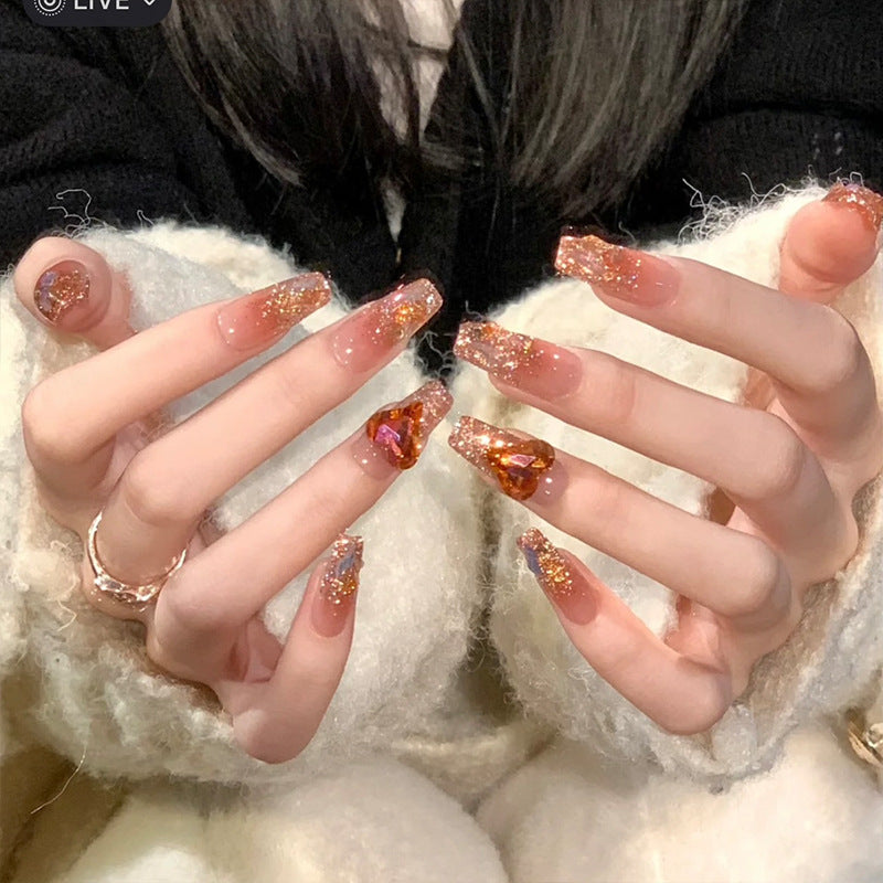 Artificial nail set with glitter and heart accents Stornfield