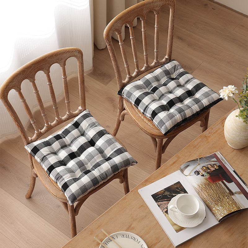 Padded quilted seat cushion with colorful button applications and non-slip underside Stornfield