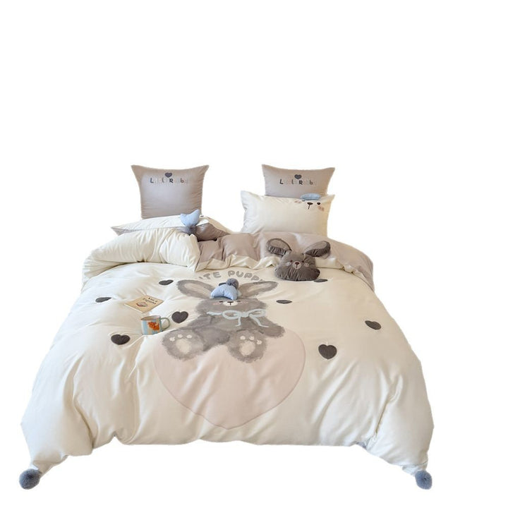 Children's bedding set with large rabbit motif, plush appliqué and pom-pom corners