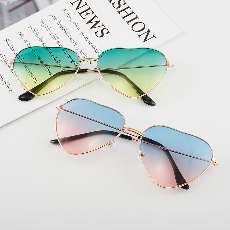 Ladies Heart-Shaped Sunglasses with UV Protection and Elegant Frame Stornfield