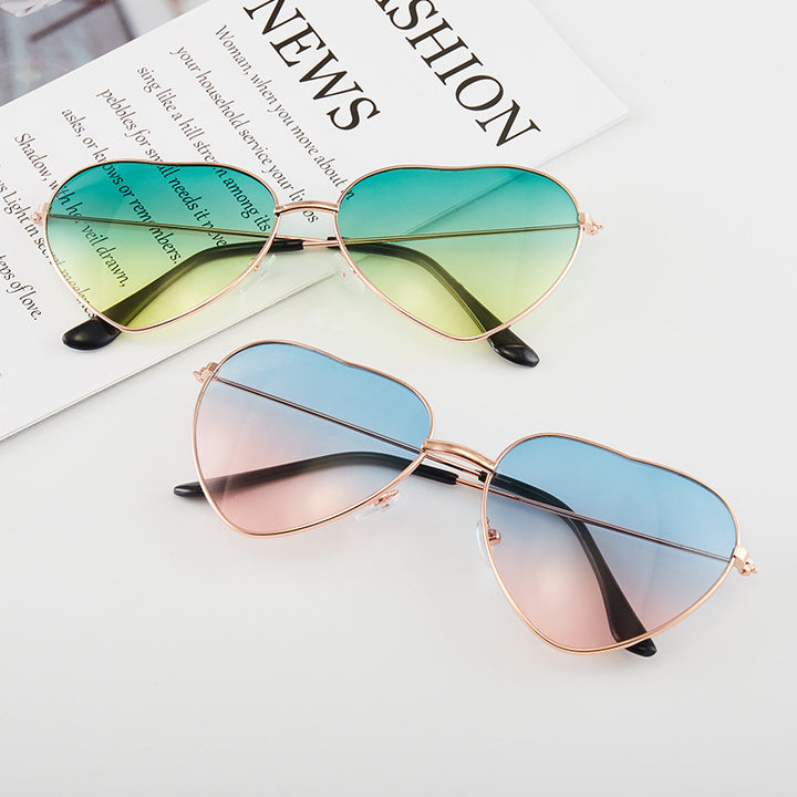 Ladies Heart-Shaped Sunglasses with UV Protection and Elegant Frame Stornfield