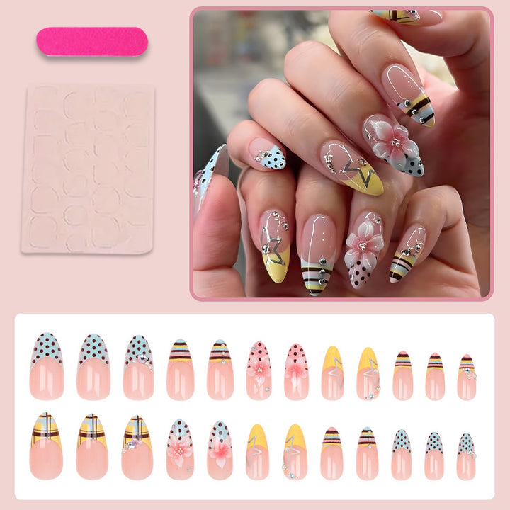 Creative nail art set with floral and geometric designs Stornfield