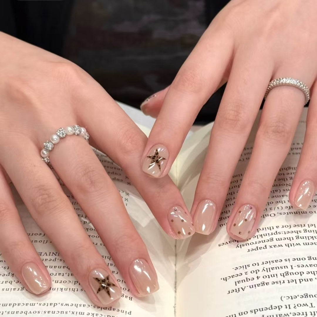 Artistic Nail Art Extensions with Star Accents
