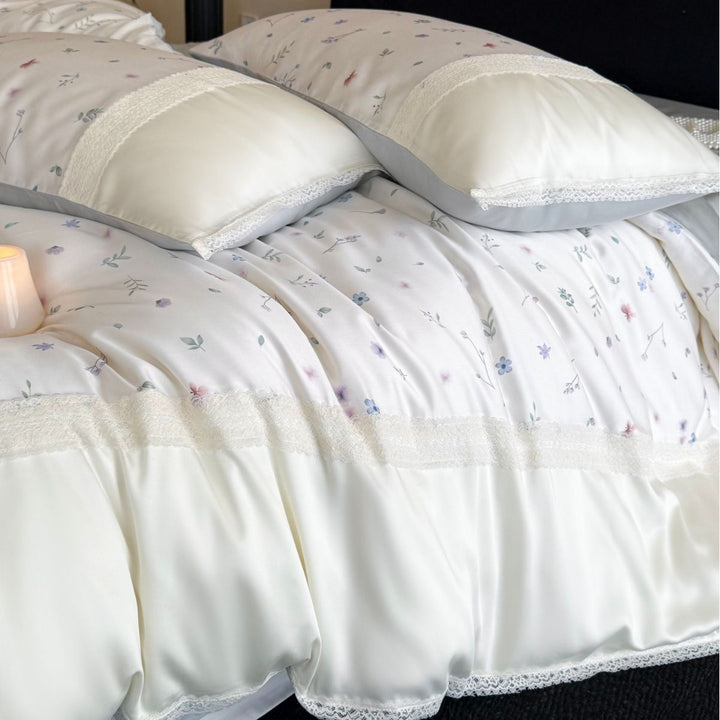Finest cotton satin bedding set with delicate floral embroidery and lace border Stornfield