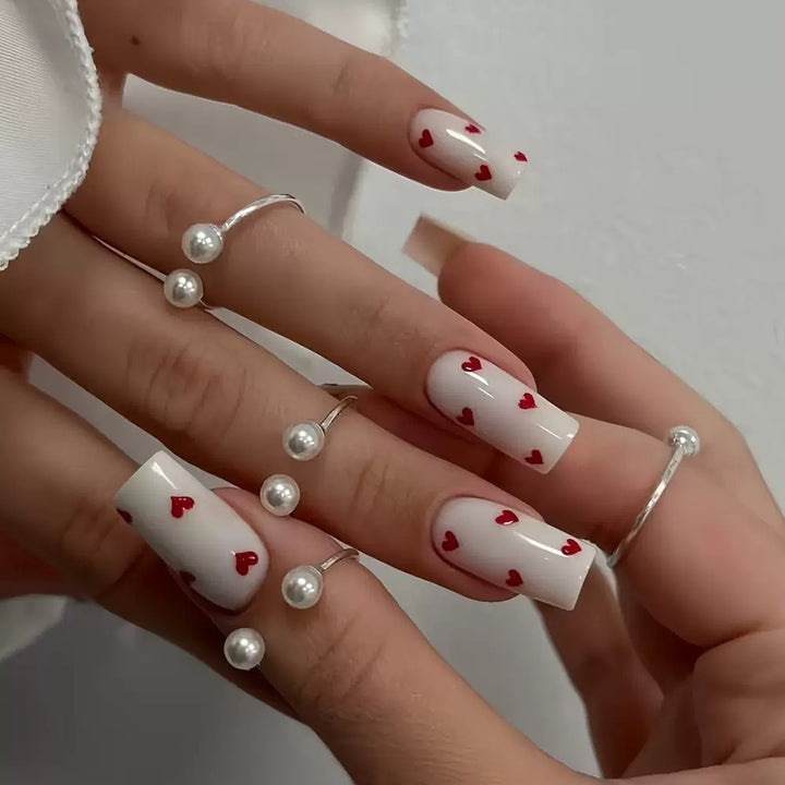 Art nail set with romantic heart design and shiny finish Stornfield