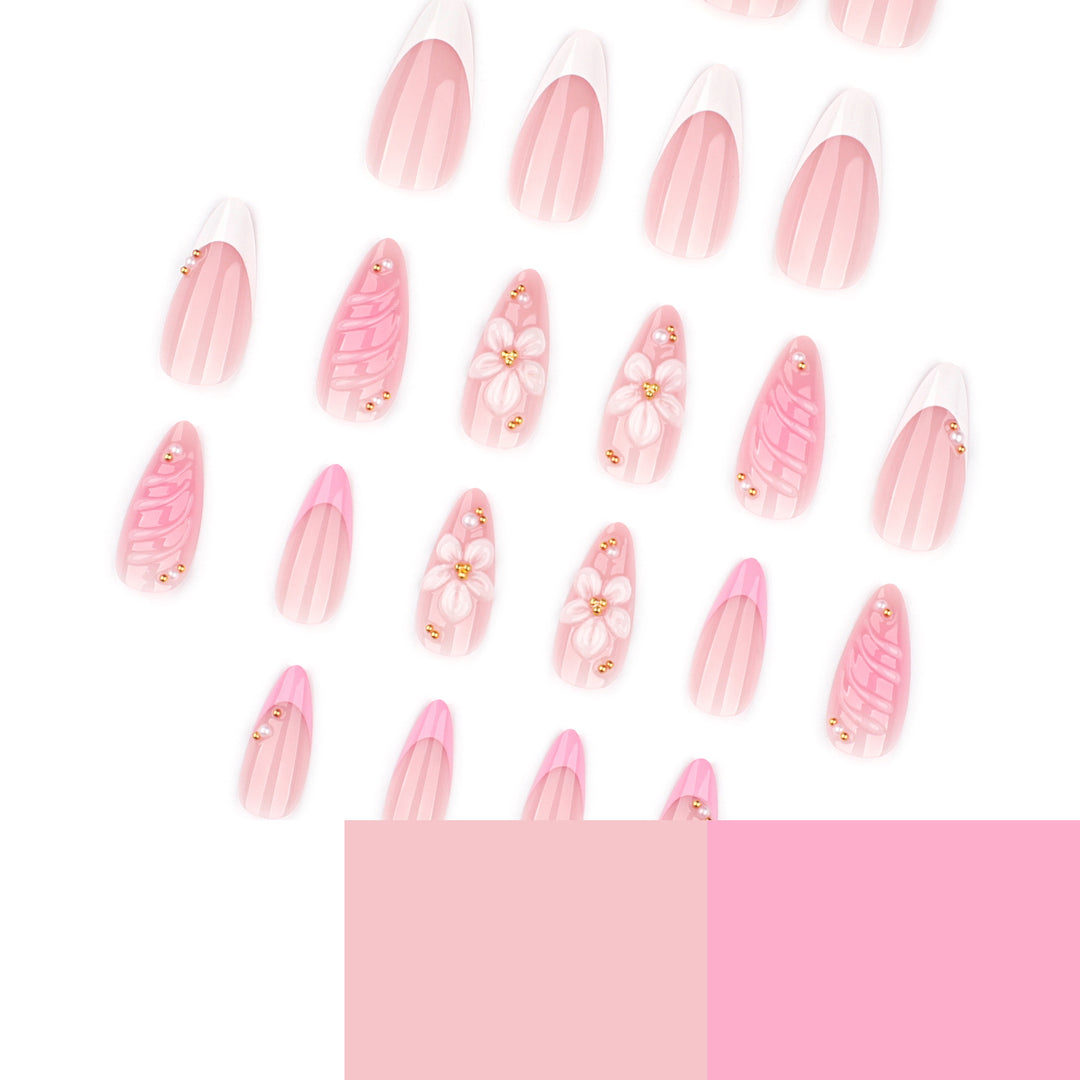 Artificial nail art with floral design and glitter accents Stornfield
