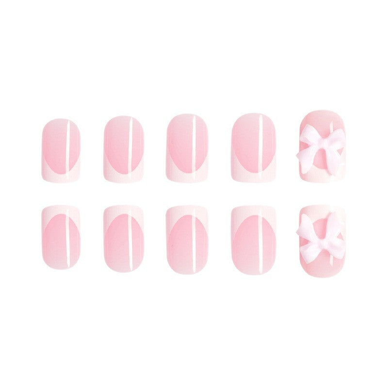 Acrylic nail set with playful bow design Stornfield