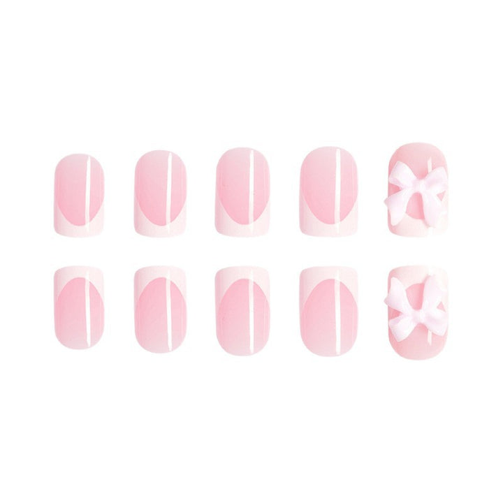 Acrylic nail set with playful bow design Stornfield