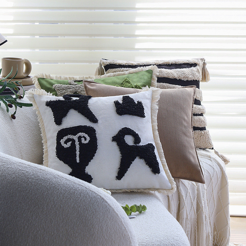 Square decorative cushion cover with hand-tufted ethnic appliqué motif and fringed edge Stornfield