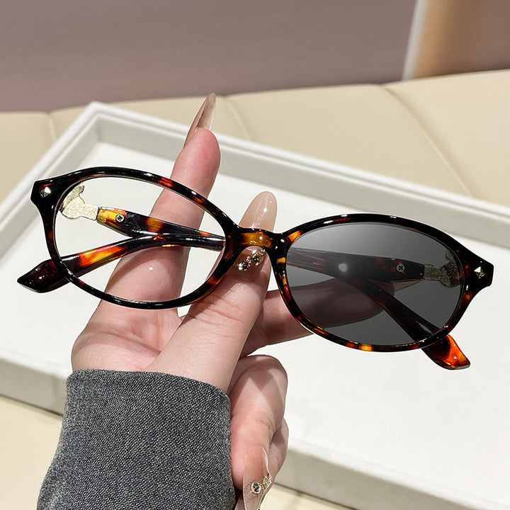 Women's fashionable optical glasses in elegant oval design with golden accents Stornfield