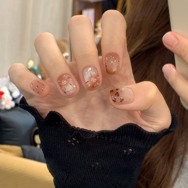 Artistic Nail Art Extensions with Floral Accents Stornfield