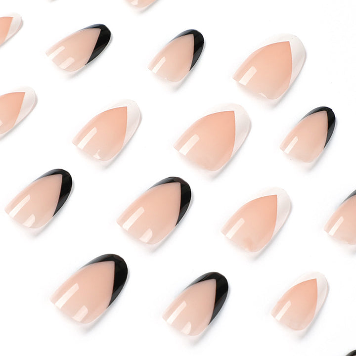 Artificial stiletto nails with elegant design and glamour embellishments Stornfield