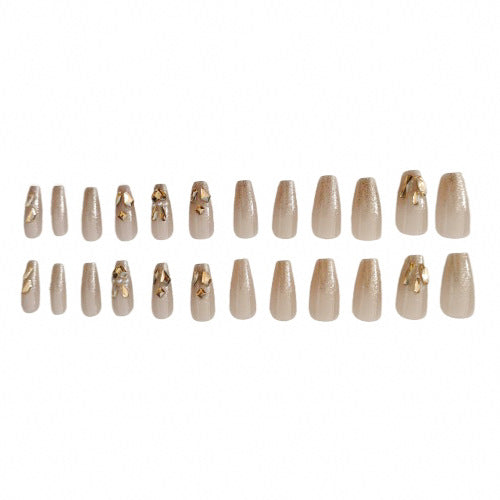 Glamorous artificial nails with gold decoration