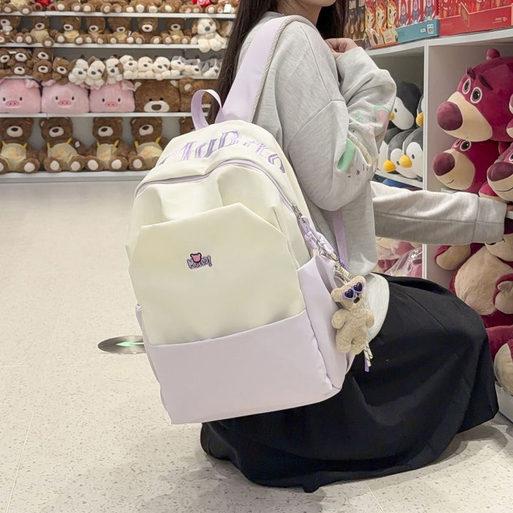 Playful backpack with embroidered Stornfield motif