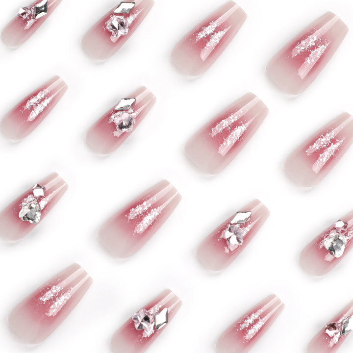 Glamorous artificial nails with glitter and crystal embellishment Stornfield