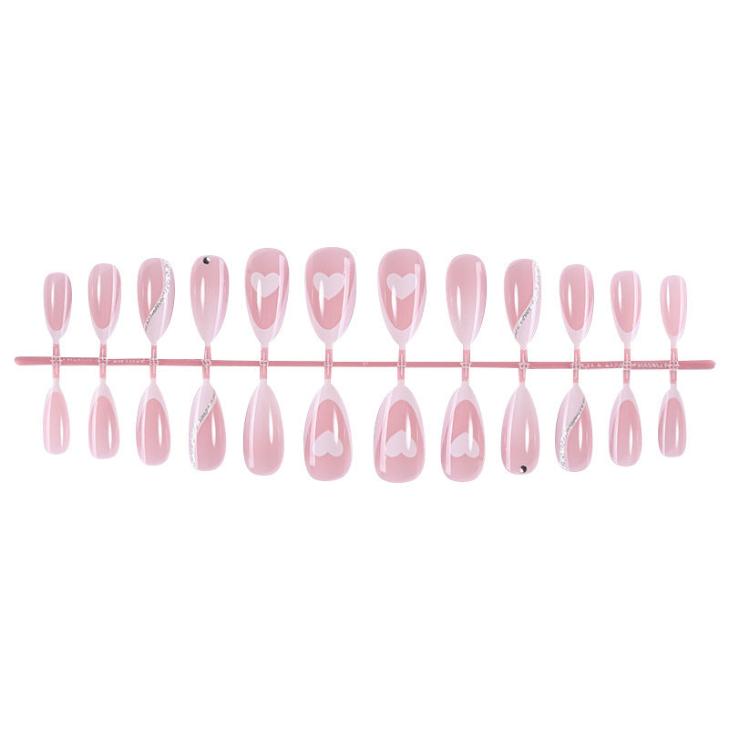 Acrylic nail set with romantic heart and glitter accents Stornfield